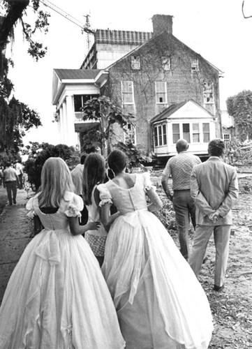 Two Tallahassee young ladies, Betsy Watt (right) and Sidney Roesh (left) watch The Columns being moved, August 26, 1971. Courtesy of the State Archives of Florida.