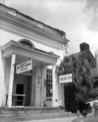 Signs: “The Bargain Box Service League of Tallahassee" and at left "Stewart Hall First Baptist Church Adult-4-55 and Up Youth Center.”